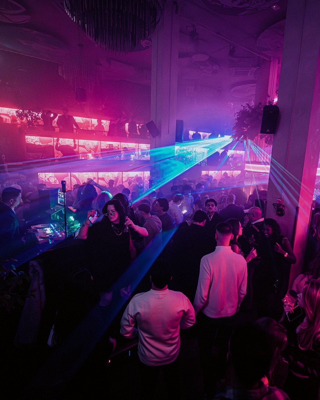 Dance floor with purple lights and lasers